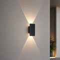 Nowoczesny kinkiet zewnętrzny LED 18W wykonany z aluminium, o klasie szczelności IP65, idealny do 0