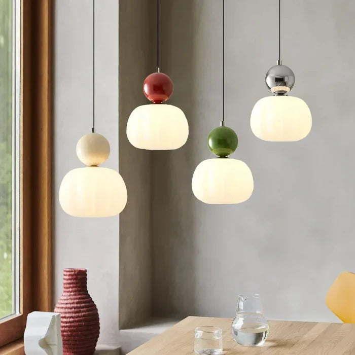 Art Deco pendant lamp — cream shade with a colorful spherical accent
