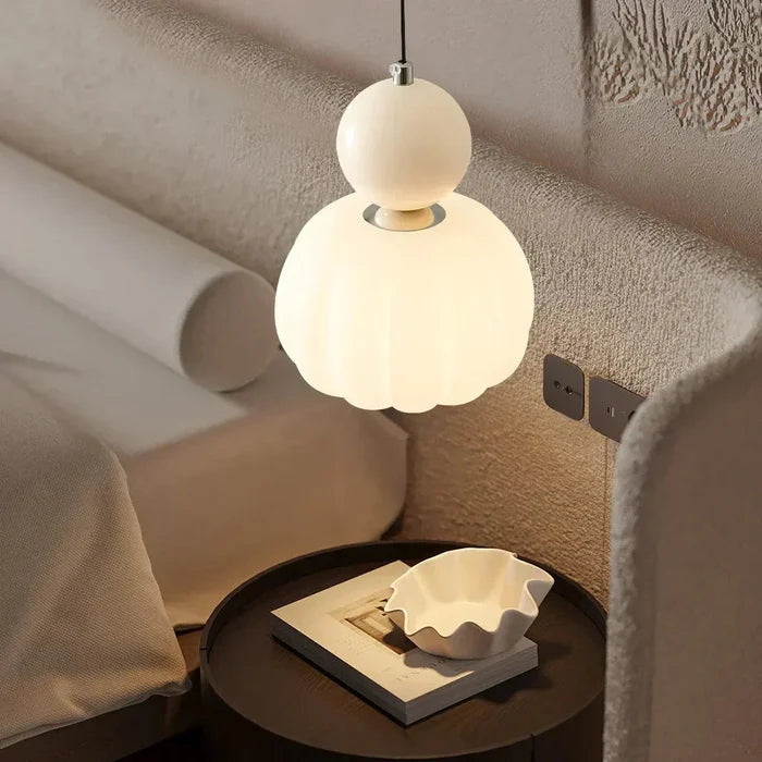 Art Deco pendant lamp — cream shade with a colorful spherical accent