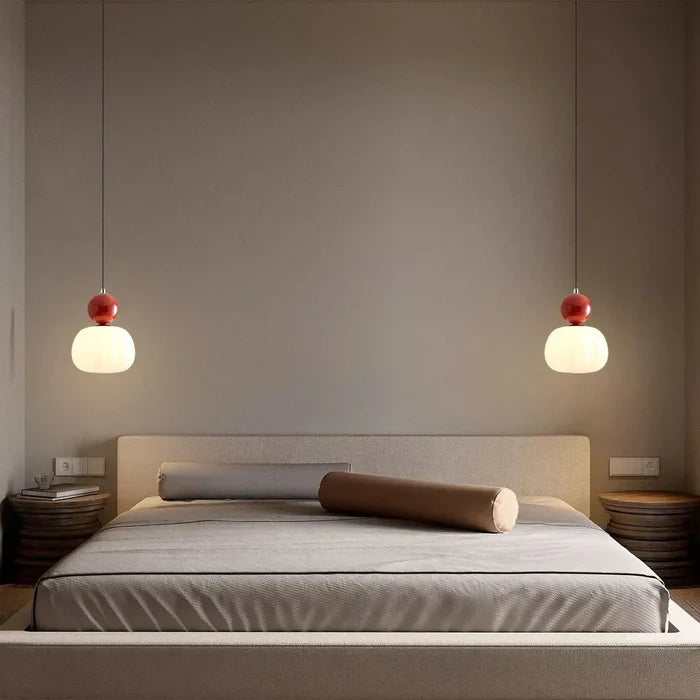 Art Deco pendant lamp — cream shade with a colorful spherical accent
