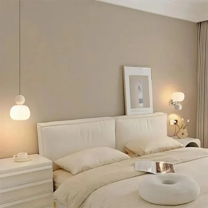 Art Deco pendant lamp — cream shade with a colorful spherical accent