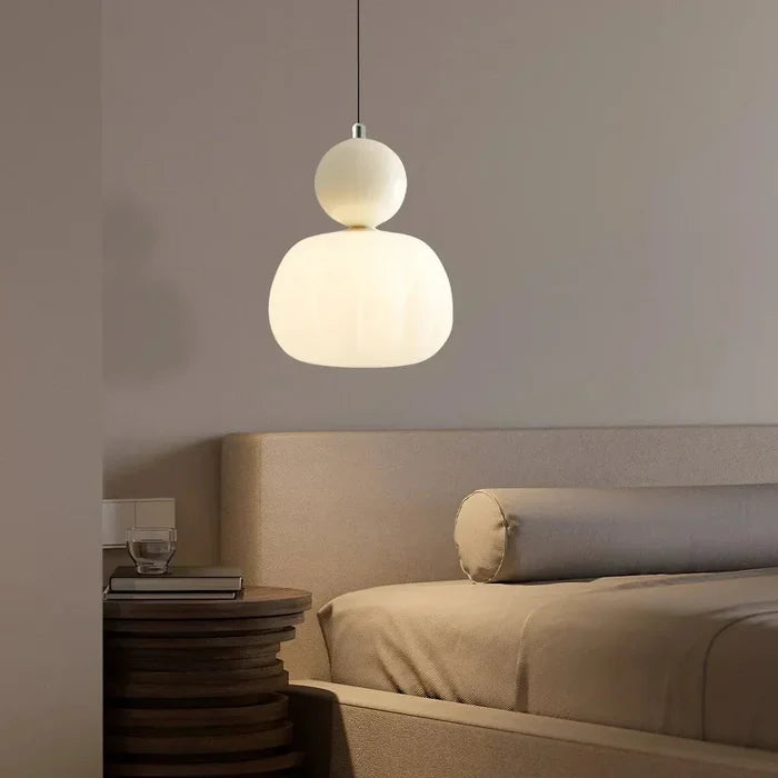 Art Deco pendant lamp — cream shade with a colorful spherical accent