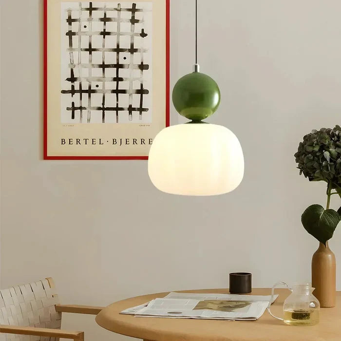 Art Deco pendant lamp — cream shade with a colorful spherical accent