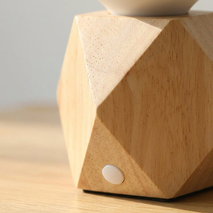 Lampka nocna z dotykowym sterowaniem, ładowaniem USB i nowoczesnym designem, featuring geometryczną podstawę LED 0