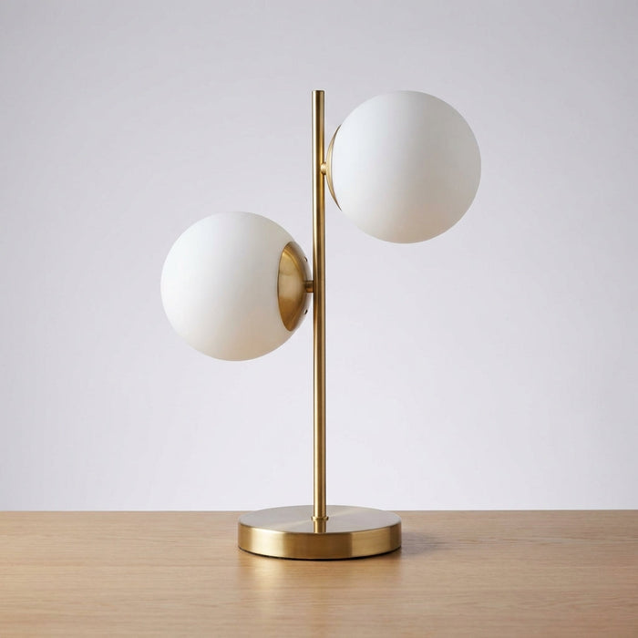 Lampa stołowa z matowego szkła, wyposażona w dwie żarówki, idealna do wnętrz w stylu sk 1