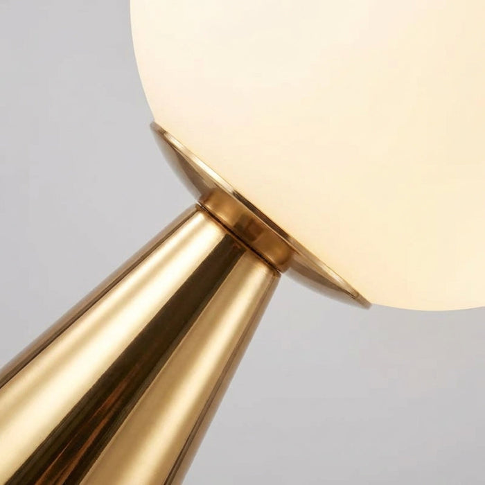 Nowoczesna lampa stołowa z matowego szkła i złotym wykończeniem, o rzeźbiarskim design 2