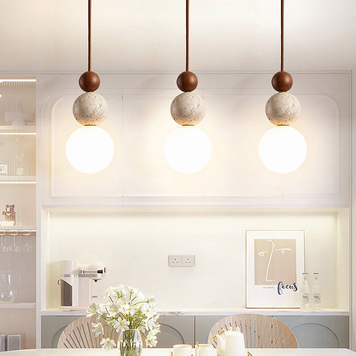Nowoczesna lampa wisząca z trawertynu i szkła – Rustykalny design do jadalni 1