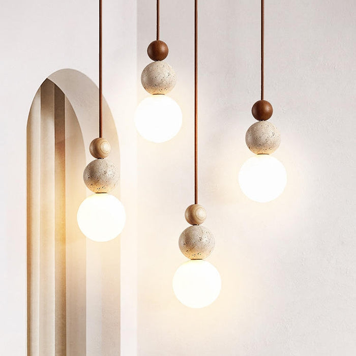 Nowoczesna lampa wisząca z trawertynu i szkła – Rustykalny design do jadalni 2