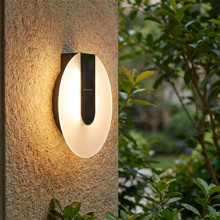 Kinkiet zewnętrzny LED o okrągłym profilu, czarny, nowoczesny design, odporny na 0