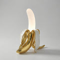 Lampa stołowa rzeźbiarska w stylu Art Deco, emitująca ciepłe światło, idealna do salon 0