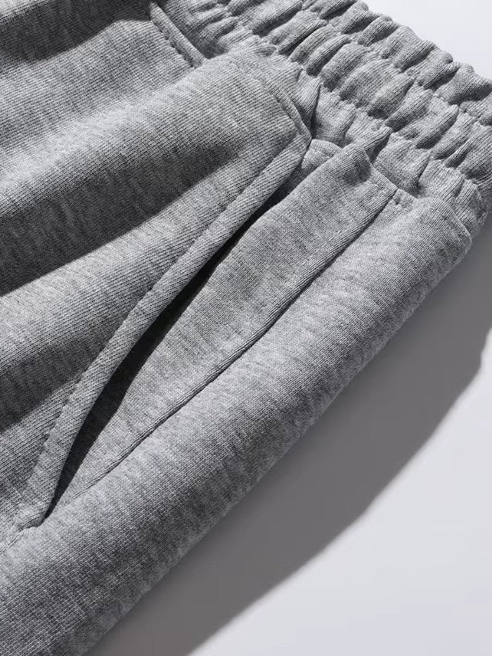 Ciepłe Spodnie Sportowe z Polaru – Essential Joggers z Elastycznym Pasem i Kieszeniami 2